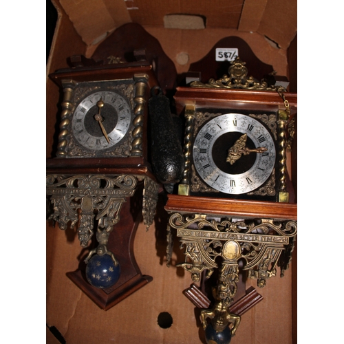 587 - Two Dutch style wall hanging clocks (2).