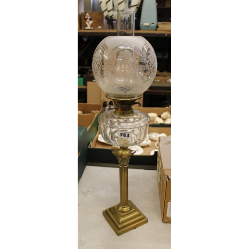 583 - Edwardian brass and glass oil lamp with column shaped support, with chimney and shade, overall heigh... 