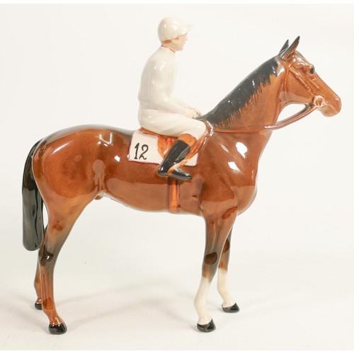 235 - Beswick jockey on bay horse 1862, light blue racing colours, over painted jacket.