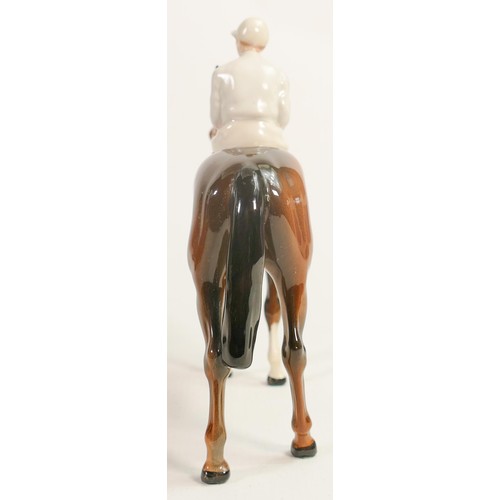 235 - Beswick jockey on bay horse 1862, light blue racing colours, over painted jacket.