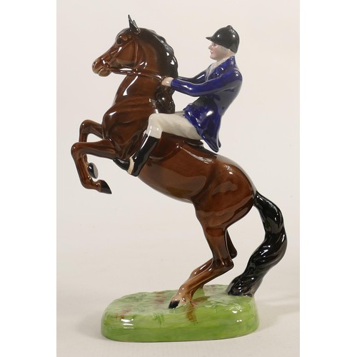 228 - Beswick rearing huntsman 868 with blue jacket.