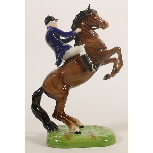 228 - Beswick rearing huntsman 868 with blue jacket.