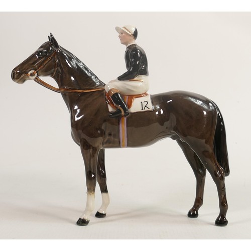 237 - Beswick jockey on Charcoal horse 1862, two broken legs and chip to hat.