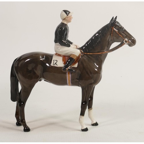 237 - Beswick jockey on Charcoal horse 1862, two broken legs and chip to hat.