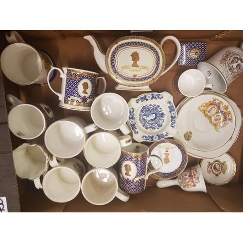 430 - A collection of Royal commemorative ware items including a James Sadler teapot, mugs, loving cup, as... 