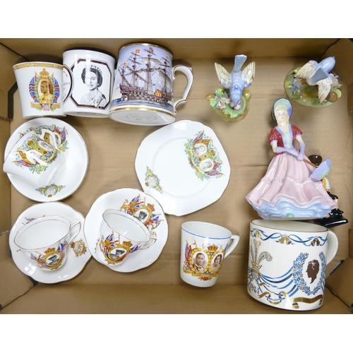 1057 - A mixed collection of items to include Commemorative mugs, Paragon Lady Figure, Royal Doulton Dicken... 