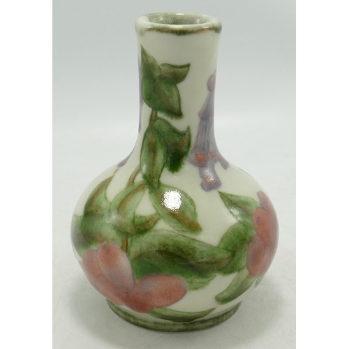 584 - Cobridge Stoneware Foxglove Patterned Vase, height 12cm, silver line seconds