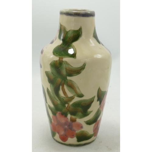 585 - Cobridge Stoneware Foxglove Patterned Vase, height 16.5cm, silver line seconds