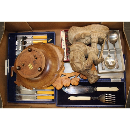 649 - A collection of boxed cutlery items together with carved wooden musical fruit/nut bowl etc (1 tray).