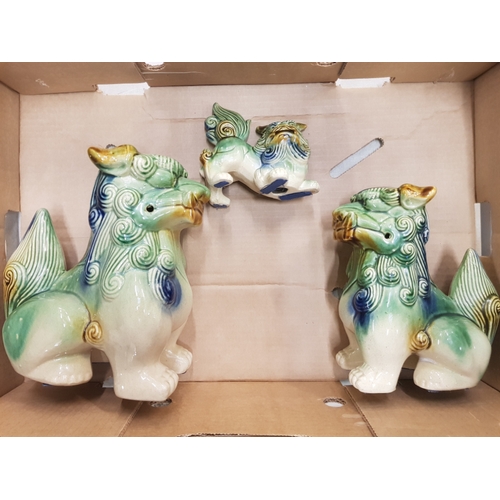 14 - A group of 3 reproduction stoneware Dogs of Fu.