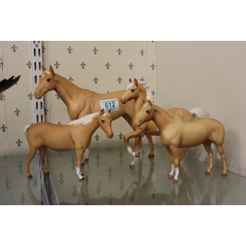 612 - A group of 4 Beswick matt palomino horses (4).