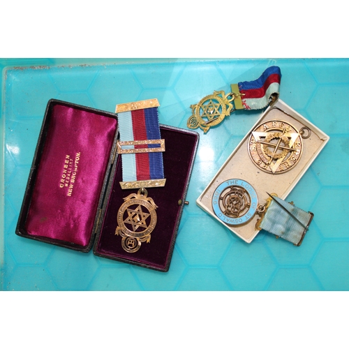 624 - An interesting group of masonic medals, 3 hallmarked silver examples and a 9ct rose gold example (4)... 