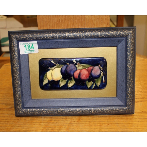 184 - Framed Moorcroft Panel with leaf & fruit decoration, panel size 7 x 14cm