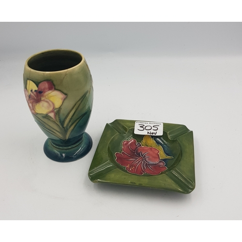 305 - Moorcroft Hibiscus pattern on green ground square ashtray together with a spring flowers pattern vas... 