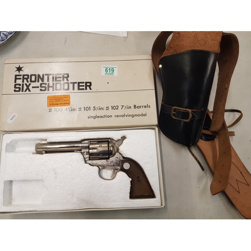 619 - Frontier Six-Shooter replica pistol (original box) and leather holster.