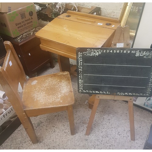 620 - Mid century child's desk and chair, with original bakelite ink wells and lift up lid, together with ... 