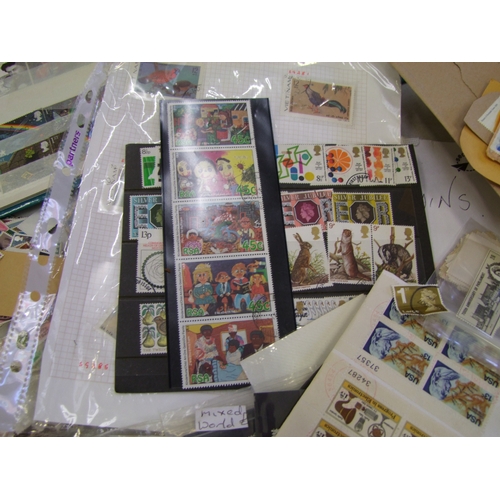 119 - A large collection of loose World stamps and stamp albums (Viewing highly recommended).