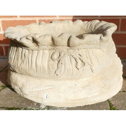 820D - Stone garden ornament of a large sack planter
