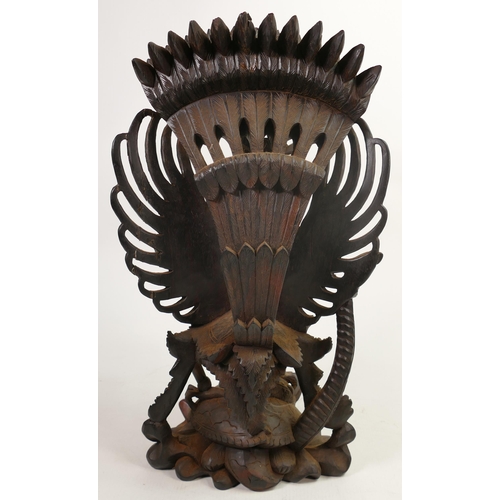 607 - Large Carved Wood Indonesian Figure of Monkey God Fighting Naga, height 46cm