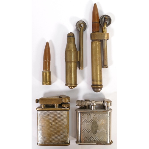 653 - Group of vintage lighters including 2 x brass Trench Art lighters made from bullet casings, and unbr... 