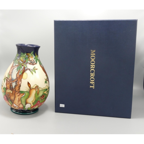 417 - Moorcroft Tortoise & The Hare Patterned Vase, dated 2008 , height 19cm, boxed