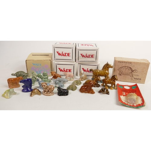 130 - A collection of Wade items to include boxed small tortoises, 1970's Horse set items , similar Dog & ... 