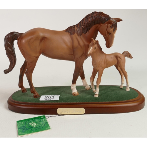 261 - Beswick connoisseur Chestnut mare and foal First Born A182 on wooden base. Foal has become unstuck