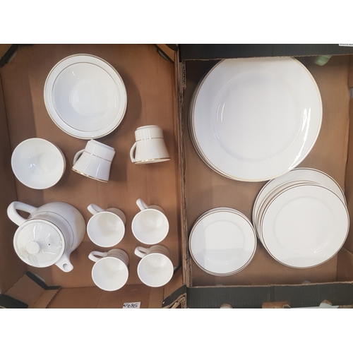 587 - Dudson white and gold tea and dinnerware items to include teapot, plates, cups etc (2 trays).