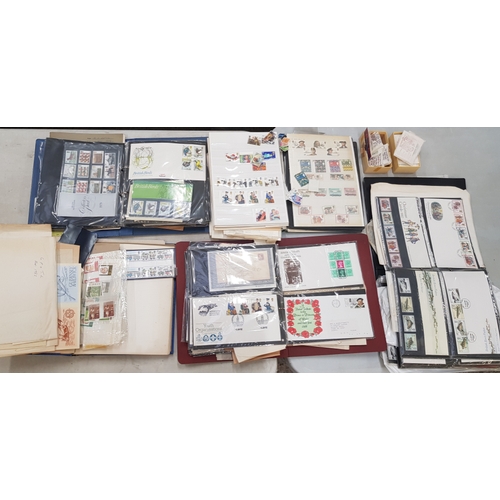 599 - A collection of UK stamps and first day covers, loose stamps, books of stamps etc (1 tray).