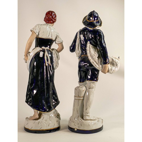 648 - Impressive large pair of Royal Dux figurines, Fisherman and lady, tallest h.54cm. (2)