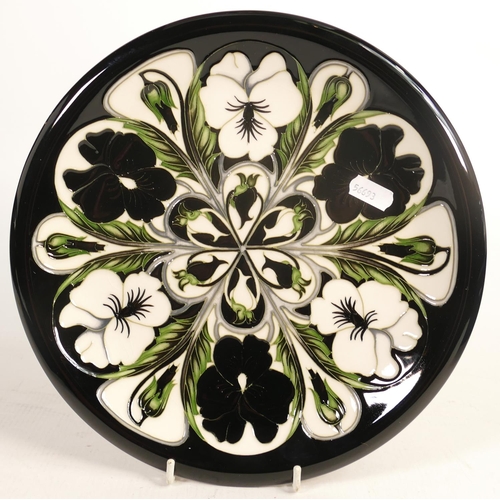 649 - Moorcroft Harlequinade plate. 26cm diameter , boxed. slight crazing