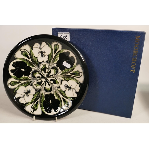 649 - Moorcroft Harlequinade plate. 26cm diameter , boxed. slight crazing