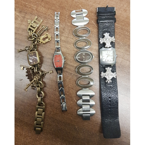 653 - Ladies Fossil designer charm bracelet wristwatch together with three other Fossil wristwatches. (4)