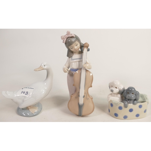 664 - Three Nao Pottery Figures of Girl with Cello, Puppies in a Basket & Goose, tallest 18cm(3)