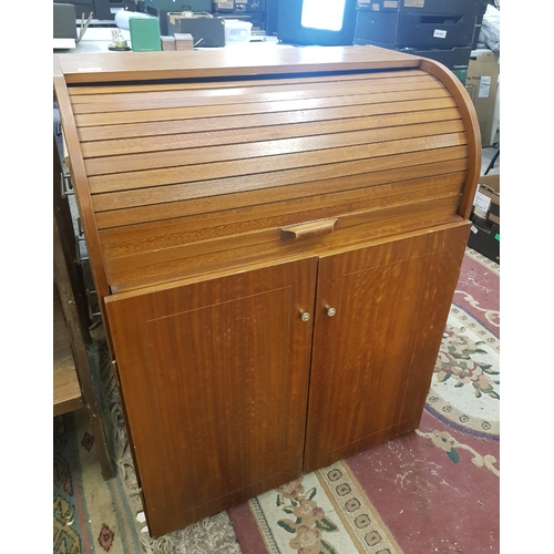 667 - Teak/teak effect tambour top students desk/side cabinet, 79cm in width.