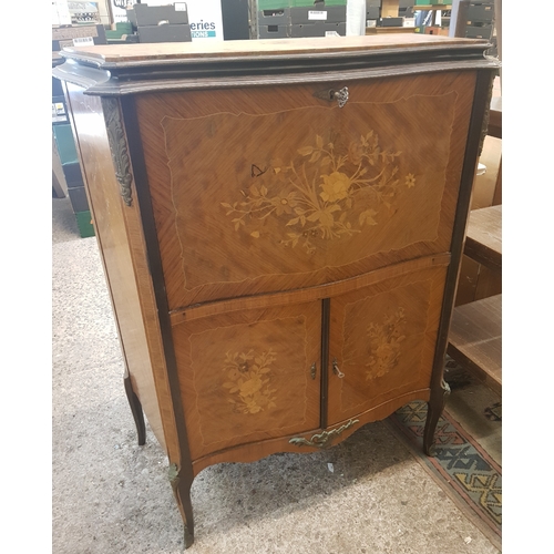 668 - Italian style inlaid drinks cabinet, 96cm in width, 119cm in height and 43cm deep.