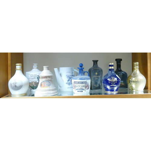 1166 - Wade Ceramics, a collection of Whiskey Bottle Decanters & similar, These items were removed from the... 