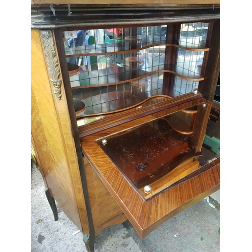 668 - Italian style inlaid drinks cabinet, 96cm in width, 119cm in height and 43cm deep.