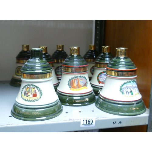 1169 - Wade Ceramics, a collection of Bells Christmas Whiskey Bottle Decanters, These items were removed fr... 