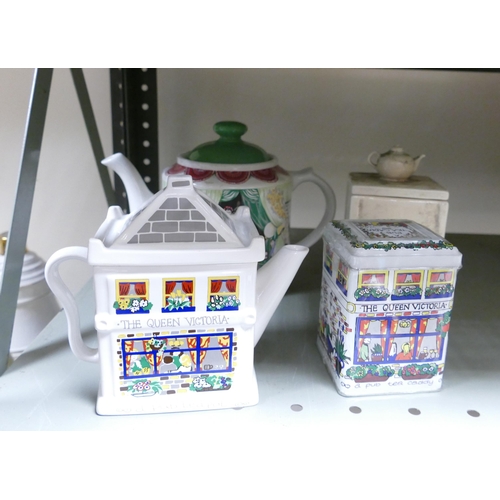 1170 - Wade Ceramics, a collection of Novelty Teapots & metal sealed tea caddy, These items were removed fr... 