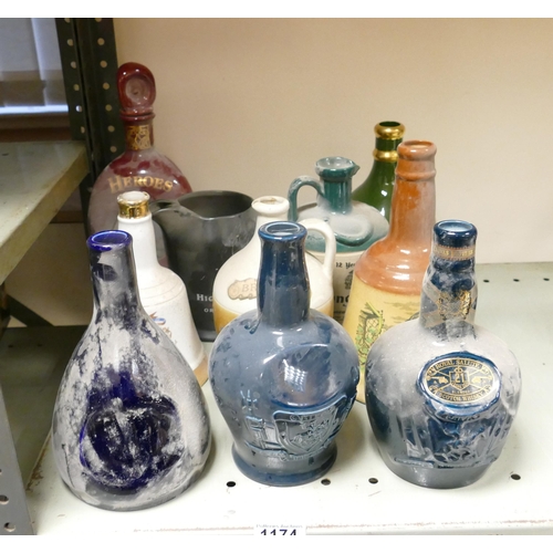 1174 - Wade Ceramics, a collection of Ceramic Whiskey & Spirits Decanters, These items were removed from th... 