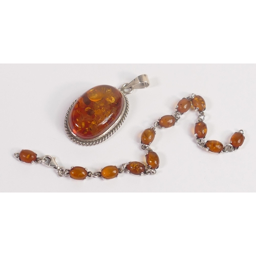 682 - Hallmarked silver large faux amber set pendant, and similar bracelet (needs single silver jump ring ... 