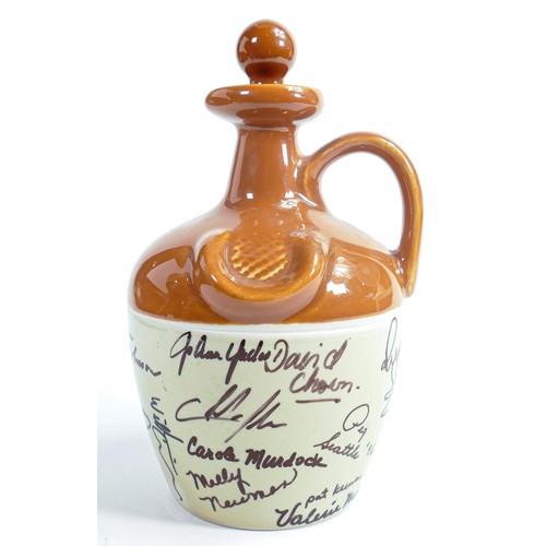 28 - Wade Stoneware Flagon signed by staff & artists of factory, height 20cm. These items were removed fr... 