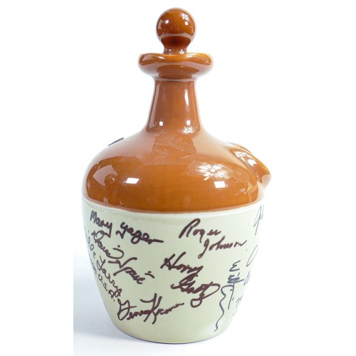 28 - Wade Stoneware Flagon signed by staff & artists of factory, height 20cm. These items were removed fr... 