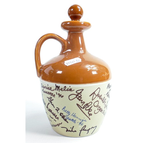 28 - Wade Stoneware Flagon signed by staff & artists of factory, height 20cm. These items were removed fr... 