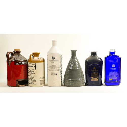 64 - Wade modern Whisky & spirit decanters including Golden Blue, Forest Gin, Usquaebach etc. These items... 