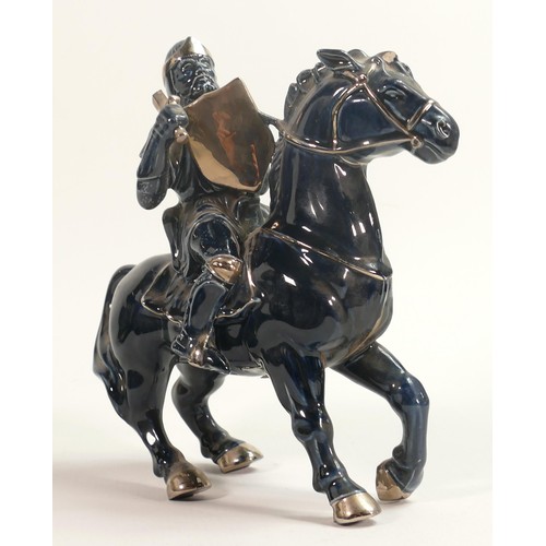 74 - Wade prototype figure of Knight on Horseback with silvered highlights, height 22cm. This was removed... 