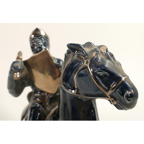 74 - Wade prototype figure of Knight on Horseback with silvered highlights, height 22cm. This was removed... 