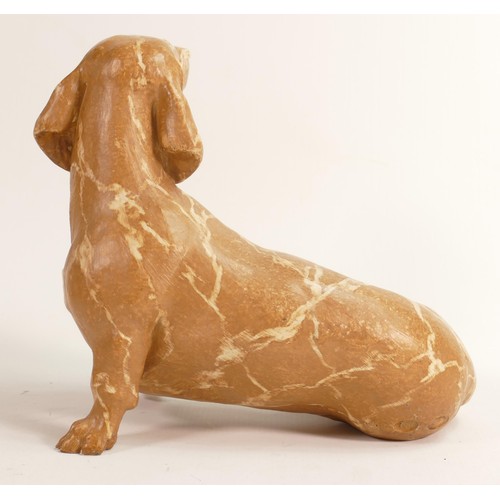 84 - North Light large resin figure of a Dachshund, height 23cm. This was removed from the archives of th... 