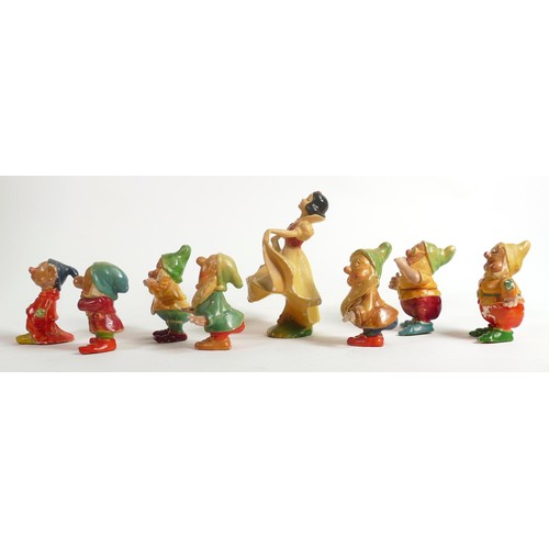 109 - A set of Wade first version Snow White and the Seven Dwarfs, c1930s in cellulose finish, some condit... 